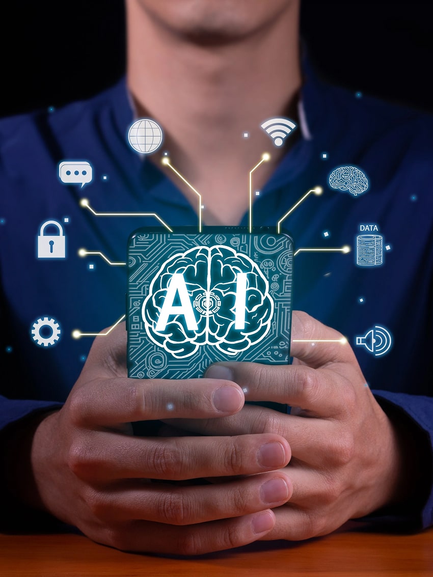 Close-up photo of a hand holding a smartphone displaying management icons