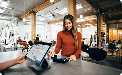 Retail professional browsing a
  digital product catalog