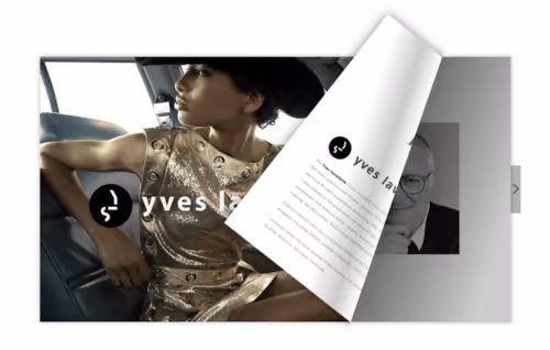 En side i et bladrekatalog er ved at blive vendt. Næste side kan ses En side i et bladrekatalog er ved at blive vendt. Næste side kan ses