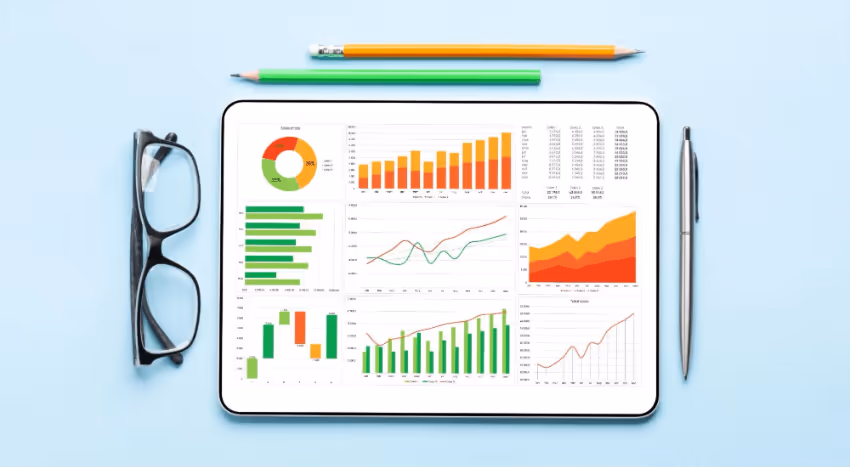 Flat lay composition on a blue background with three pens, a pair of glasses, and a tablet displayin Flat lay composition on a blue background with three pens, a pair of glasses, and a tablet displayin