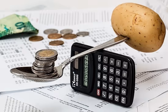 Coins and calculator. Photo: Pixabay Coins and calculator. Photo: Pixabay