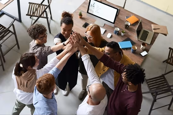 A team high-fiving A team high-fiving