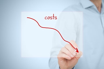 A woman drawing a graph with a downward slope, with the word 
