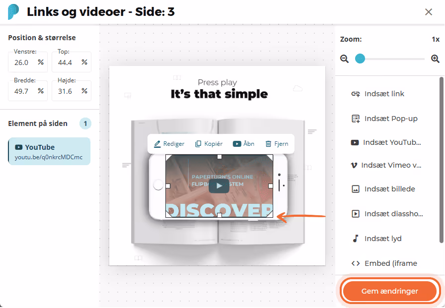 Indlejret YouTube-video vist ovenpå en åben bog i flipbooken, med knapper til rediger, kopier, åbn o Indlejret YouTube-video vist ovenpå en åben bog i flipbooken, med knapper til rediger, kopier, åbn o