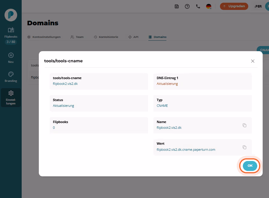 CNAME-Detail-Modal zeigt DNS-Einträge und die Schaltfläche „OK“ hervorgehoben. CNAME-Detail-Modal zeigt DNS-Einträge und die Schaltfläche „OK“ hervorgehoben.