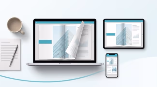 A laptop, a tablet and a phone on a desk, all showing the same annual report.