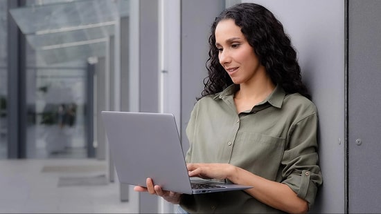 A woman using a laptop A woman using a laptop