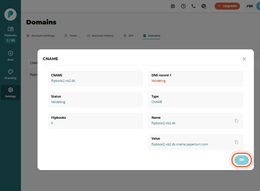 CNAME details modal displaying DNS records and the “OK” button highlighted.