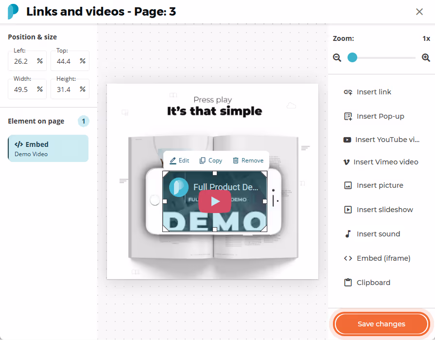 The embedded video now appears centered on the flipbook page with a play button visible.