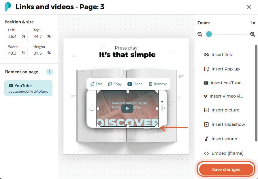 Embedded YouTube video displayed on top of an open book in the flipbook, with edit, copy, open, and 
