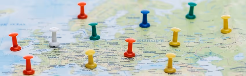 Colorful pins on a map of Europe Colorful pins on a map of Europe