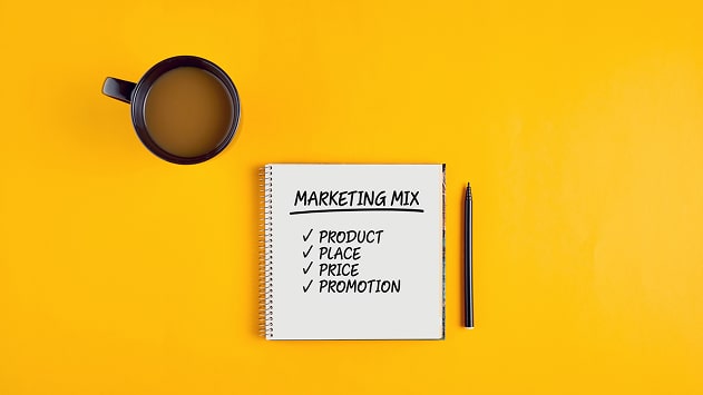 Notebook listing the four ps of marketing