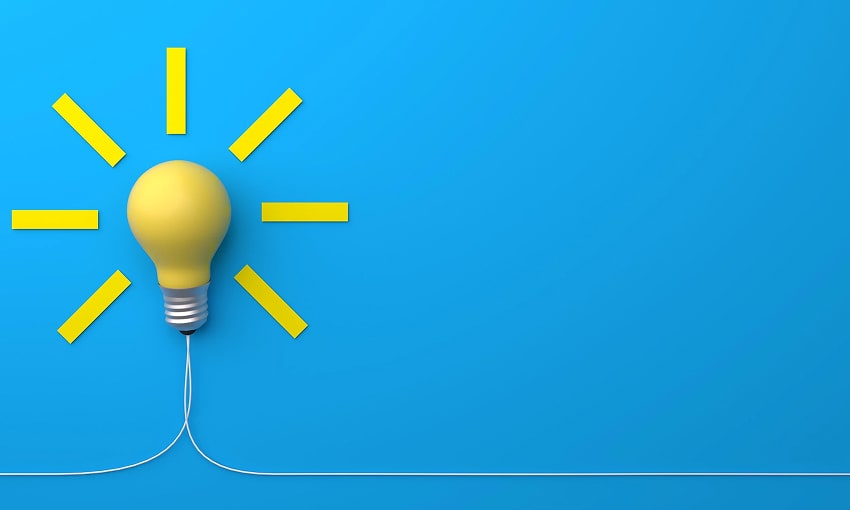 Yellow lamp in a blue background representing a new idea