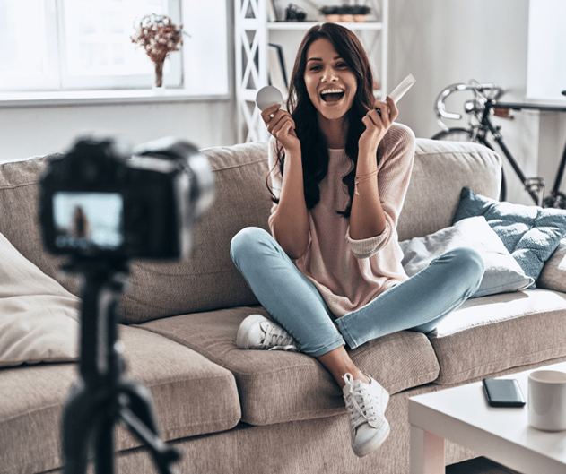 Influencer showing products in front of her camera