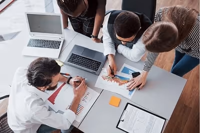 Team working together. Source: Freepik