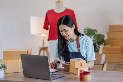 Business woman administrating online shop