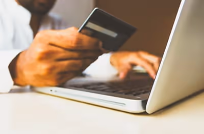 Paying online. Image source: https://unsplash.com/photos/Q59HmzK38eQ 