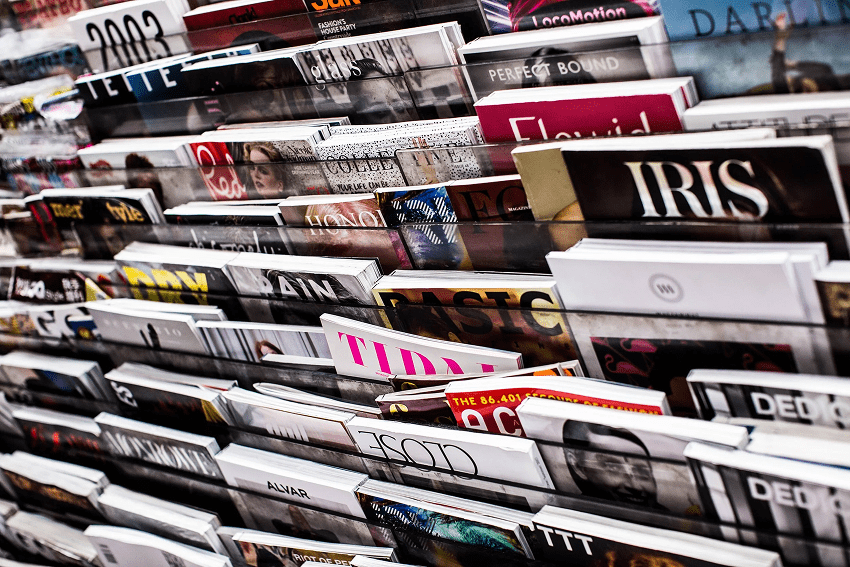 Many magazines on a stand