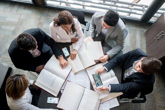 Business people discussing sales