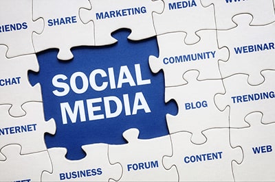 Puzzle pieces with social media strategy key points on them.