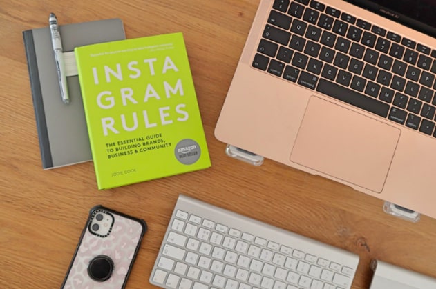 Books and laptop on a desk