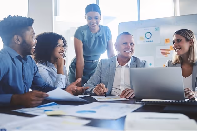 A group of people in a company meeting A group of people in a company meeting