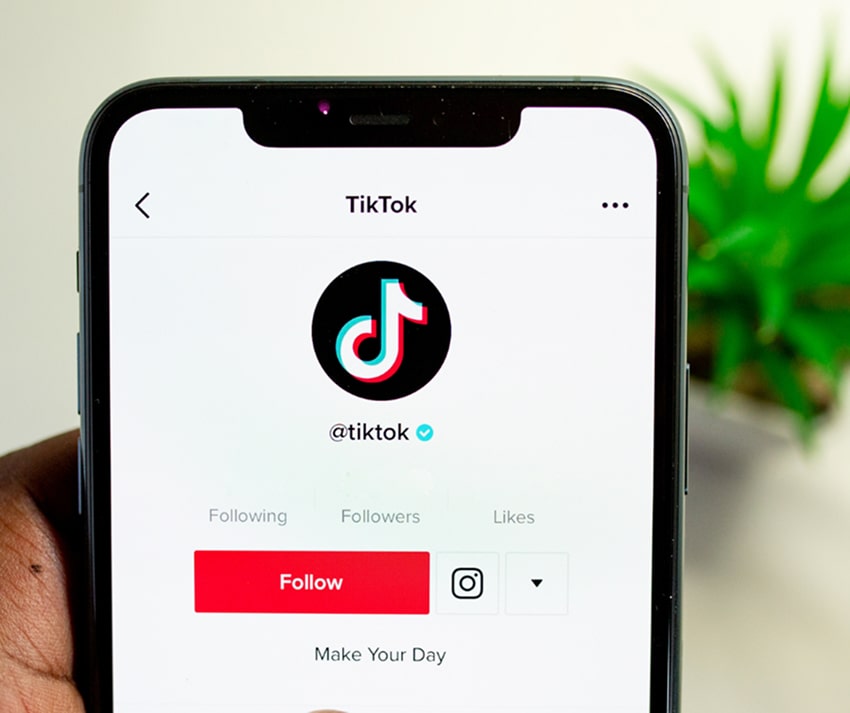 Phone with the TikTok app open
