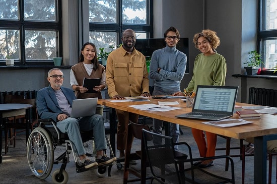 A diverse group of people in a meeting room